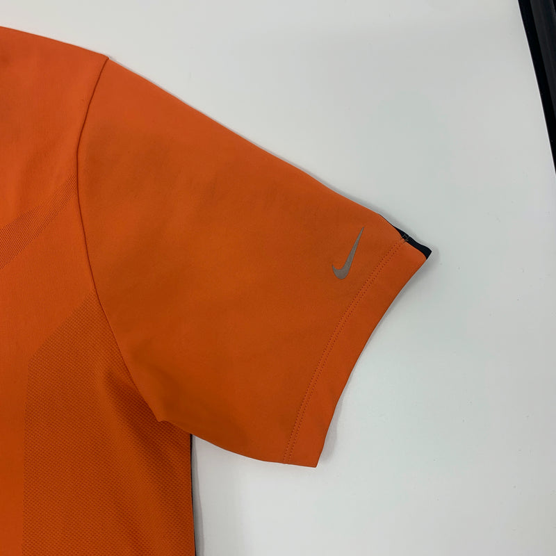 Peach Tiger Woods collection Nike polo size large