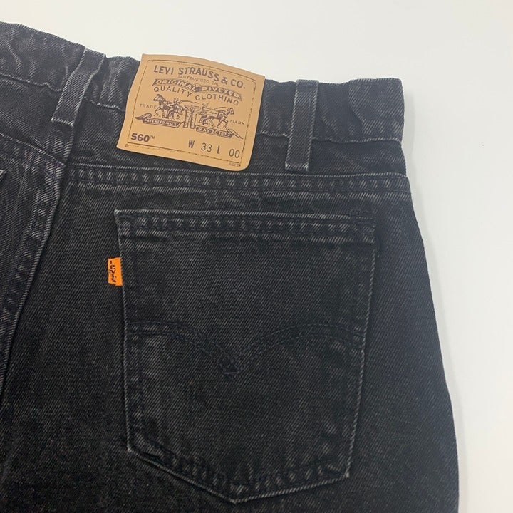 90s Black Levis 560 Orange Tab Denim Jeans Size 33 Made in USA
